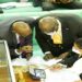 Committee chairperson, Emmanuel Otaala (L), Deputy Attorney General, Jackson Kafuuzi (C)and State minister for Minerals, Peter Lokeris consulting Deputy Speaker Anitah Among