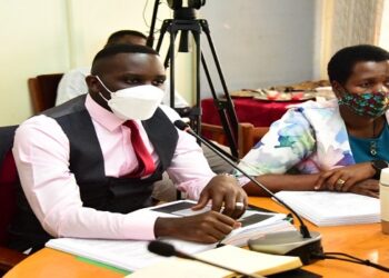 Hon Ssenyonyi(L) with Hon Akello Lucy on his left during the committee meeting