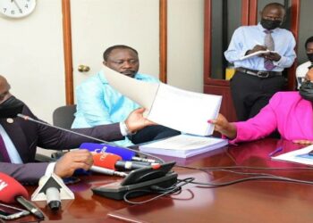 The LOP, Hon Mathias Mpuuga (L), Hon Francis Mwijukye and Hon Joyce Bagala at the launch of the complaints book