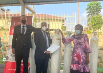Minister Aceng receives oxygen cylinders from Denmark officials