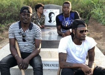 The Mayanja family at AK 47's resting place