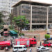 Fire brigade vehicles parked at the Western wing of the Central bank in Kampala after it gut on fire at around 1:30 in the afternoon. According to the Manager of Communication Christine Alupo at the bank, the cause of the fire is un identified but investigations are going on. She adds that also unspecified amount of property was destroyed. All the employees had to move out of the building as fire was being put off. PHOTO BY ABUBAKER LUBOWA.