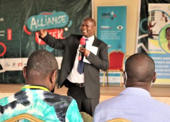 Jackson Chekweko RHU ED addresses youths about gender equality in Kasese district