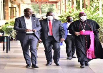 L-R: Br Mugabo, Hon. Mpuuga and Bishop Jjumba at the fundraising drive at Hotel Africana in Kampala