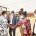 State House Comptroller Jane Barekye interacts with Mbale RDC Sumini Nasike as other leaders look on during a pre-launch meeting of Mbale and Kween industrial hubs in Lukhonge hub Friday