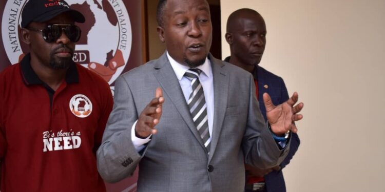 L-R: NEED's Chief of Staff Charles Basajja with NEED top leader Joseph Kabuleta in Tooro Sub Region on Friday