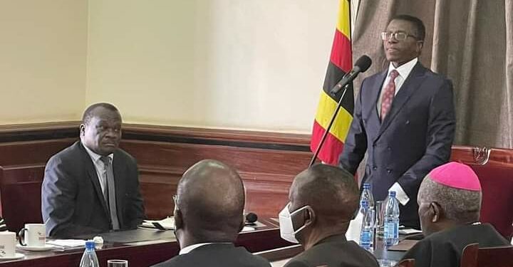 L-R: CJ Owiny-Dollo and Katikkiro Charles Peter Mayiga at Bulange Mengo