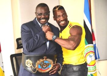 The late Speaker Jacob Oulanyah with Golola Moses