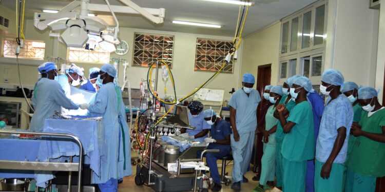 Heart surgeons inside Uganda Heart Institute operating room