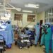 Heart surgeons inside Uganda Heart Institute operating room