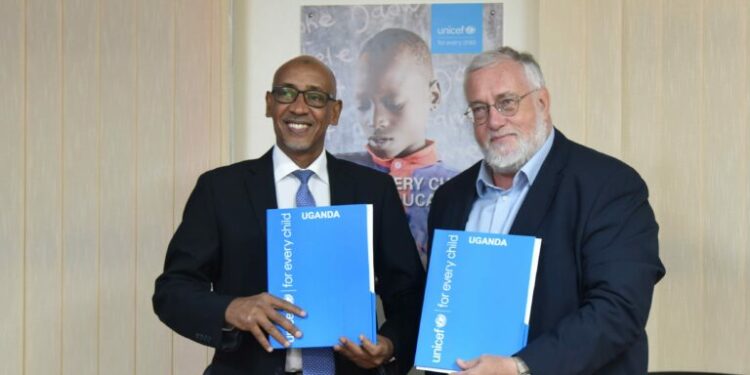 Dr Munir Safieldin, UNICEF Representative in Uganda (Left) with the Belgian Ambassador to Uganda Rudi Veestraeten