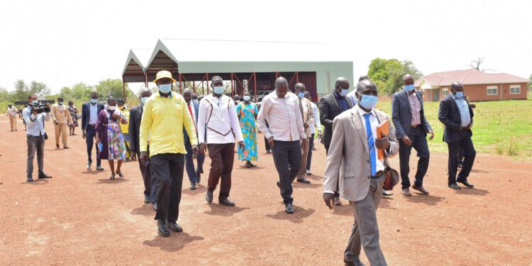 Madi Sub-region Industrial Zonal Hub in Adjumani Hub Manager Robert Aluma Mamawi leading a team of political leaders  from Adjumani Obongi and Moyo district in attendance were the Political leaders from the West Nile districts as the tour the Madi Sub-region Industrial Zonal Hub in Adjumani on 31st March 2022. Photo by PPU / Tony Rujuta.