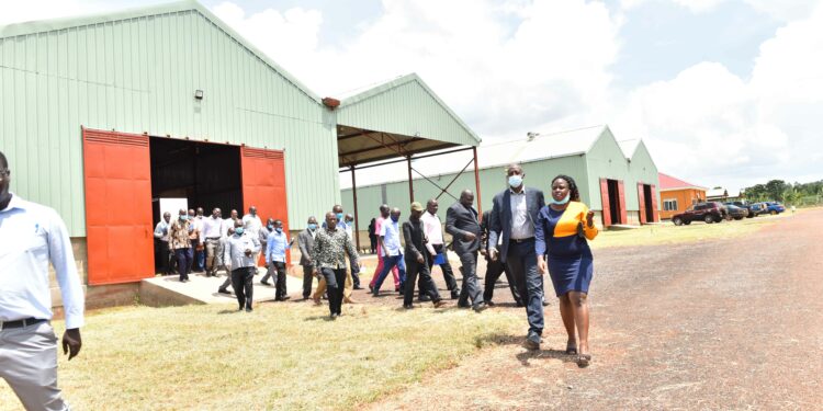 The Busoga Sub-region Industrial Zonal Hub manager Phiona Mubugumya in the presence of Representative of the PS Local Government Julius Muhairwe led a tour of the Presidential Initiative for Industrial Zonal Hub Busoga Sub-region  at Nakabango village in Jinja City on 13th April 2022. Photo by PPU / Tony Rujuta.