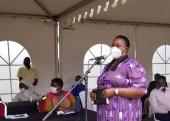 Minister Babalanda delivering her speech during the vehicle handover ceremony at Kololo Airstrip on Friday