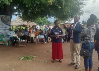 Deputy RDC Alebtong - Odongo Stephen speaks during the commissioning of the borehole in Abako sub county, Alebtong district