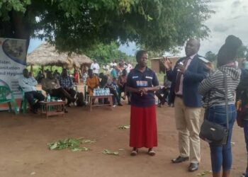 Deputy RDC Alebtong - Odongo Stephen speaks during the commissioning of the borehole in Abako sub county, Alebtong district