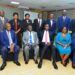 Seated from right: Finance Ministry PS Ramadhan Ggoobi, New board Chair Priscilla Mirembe Serukka, Minister of State for Finance Henry Musasizi, works and Transport Minister Gen Katumba Wamala and Ministry of Transport PS Waiswa Bageya