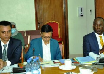 Mediheal Hospital directors led by the Board chairperson, Mike Mukula (R), appearing before the Ad hoc Committee at Parliament.