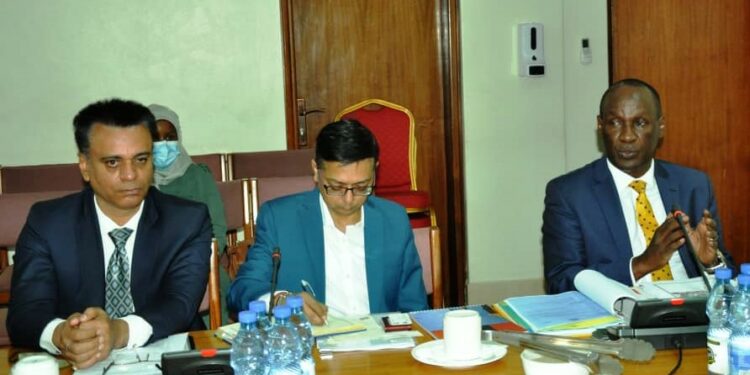 Mediheal Hospital directors led by the Board chairperson, Mike Mukula (R), appearing before the Ad hoc Committee at Parliament.