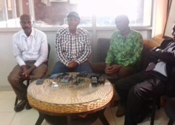 Pierre Mbabazi with the head of laity Diocese of KIGEZI and Canon Ivan Batuma