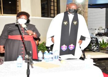The clergy lead prayers at the home of the former speaker