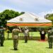CDF Gen Mbadi (C) and a team of five officers salute the Commander in Chief Gen Museveni during the high command meeting at Entebbe