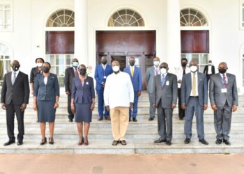 President Yoweri Museveni in a group photo with the Director of Public Prosecutions Jane Frances Abodo and her team after a meeting at the State House Entebbe on 26th May 2022. Photo by PPU/ Tony Rujuta.