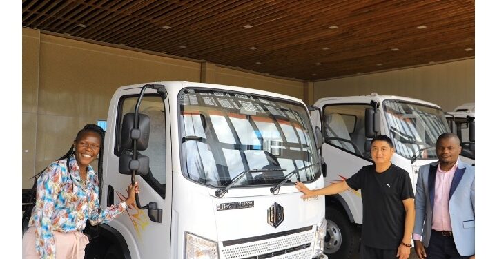 Minister Anite at the car making unit in Namanve