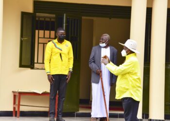 President Yoweri Museveni with Andrew Ojok and Mzee Nathan L'Okori
