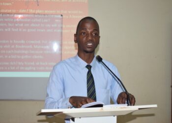 Author Abed Kivumbi giving a keynote speech at the launch