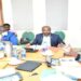 Hon. Sarah Opendi (R) fielding questions to Opec Prime officials during the meeting at Parliament