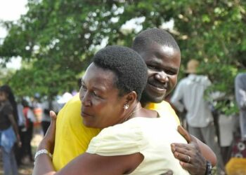 Andrew Ojok with NRM director for Mobilisation, Rosemary Sseninde