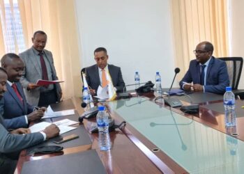 Mr, Mathias Kamugasho, the Service Cops Managing Director (Left), Mr. Joseph Kiiza Ndiho, the Service Cops’ Executive Chairman, (2nd left), Mr. Tsehay Shiferaw (2nd right), the Awash Bank Chief Executive Officer and the Chief Technology Officer; Mr Tilahuntem Temotewos (right) at the signing of the MoU.