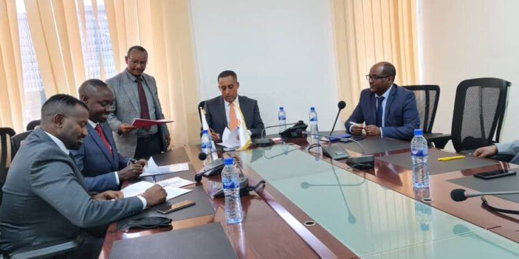 Mr, Mathias Kamugasho, the Service Cops Managing Director (Left), Mr. Joseph Kiiza Ndiho, the Service Cops’ Executive Chairman, (2nd left), Mr. Tsehay Shiferaw (2nd right), the Awash Bank Chief Executive Officer and the Chief Technology Officer; Mr Tilahuntem Temotewos (right) at the signing of the MoU.