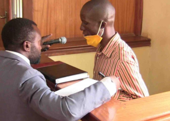 WAMALA AND HIS LAWYER TURYOMWE IN COURT