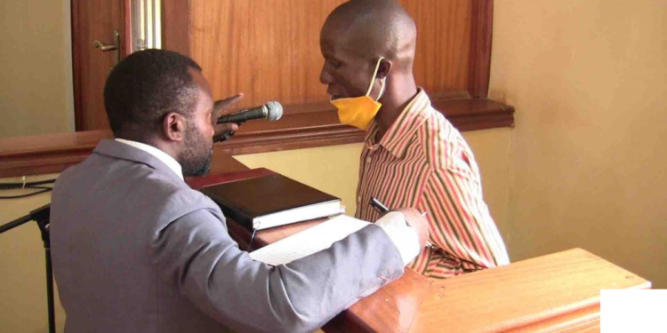 WAMALA AND HIS LAWYER TURYOMWE IN COURT