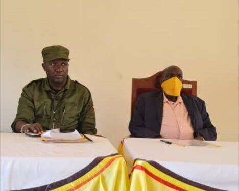 Manifesto Implementation Unit Director Mr Willis Bashasha (left) with the Secretary in the Office of the President Hajj Yunus Kakande