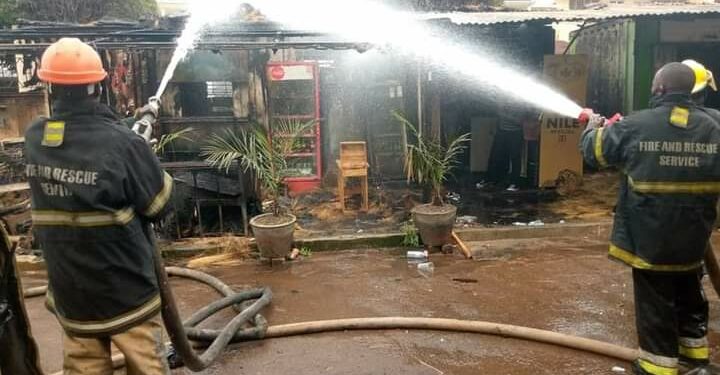 Police Fire brigade putting off the fire that broke out at one of the kiosks in the vicinity of National Theatre