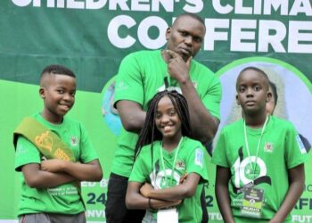 Mr Joseph Masembe with some of the Little Hands Go Green Ambassadors