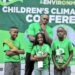 Mr Joseph Masembe with some of the Little Hands Go Green Ambassadors