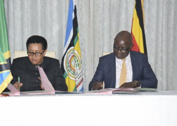 The Minister of Defence and Veteran Affairs Vincent Bamulangaki Ssempiijja with the Minister of Defence of the United Republic of Tanzania Dr Stergomena L. Tax