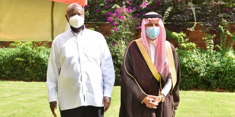 President Yoweri Museveni and H.E. Ahmed Abdul Aziz Kattan, Advisor in the Royal Court Special Envoy of the King of Saudi Arabia pose for a photo after a meeting at State House Nakasero on 23rd May 2022. Photo PPU/ Tony Rujuta.