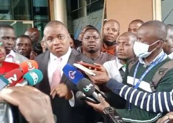 Joyce Bagala with her lawyer Erias Lukwago addressing the media after the court decision