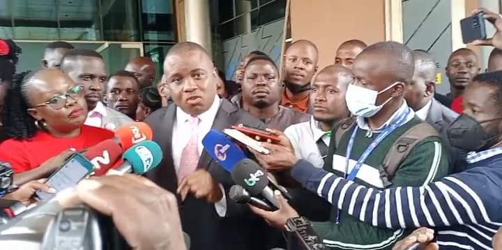 Joyce Bagala with her lawyer Erias Lukwago addressing the media after the court decision