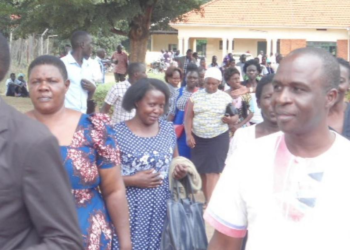 Bishop Tukei with christians in Soroti