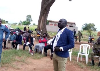 DRDC Okidi gives speech during the community dialogue.