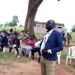 DRDC Okidi gives speech during the community dialogue.