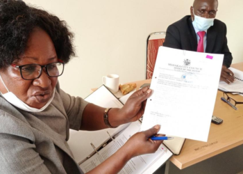 Mayor Florence Namayanja attending a road's committee meeting