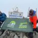 Wekesa and kabushenga at the Margherita Peak which is the highest point of the Rwenzori Mountains