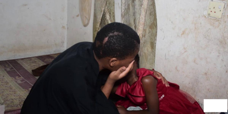 Rashidah Nampijja with her daughter at home